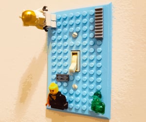 24 Playfully Decorative Light Switch Plates That'll Really Light Up Your Room
